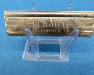 Lot 246. Hohner tremolo Tuckaway harmonica.