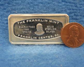 Lot 368. Franklin Mint Bank-marked sterling silver ingot. 65.5 grams.