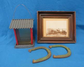 Lot 162. Double Ringer horseshoes, bird feeder, and a framed threshing photo
