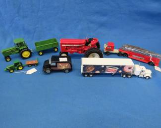 Lot 128. Tractors, trucks, and more
