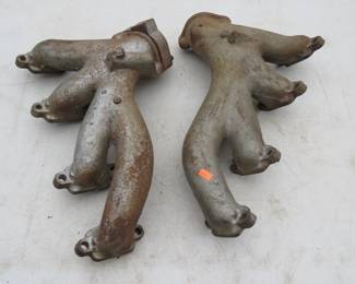 Lot 171. V8 exhaust manifolds. See photo from seller regarding details. AS-IS