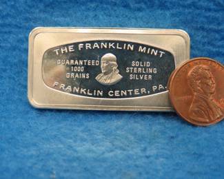 Lot 370. Franklin Mint Bank-marked sterling silver ingot. 65.3 grams.