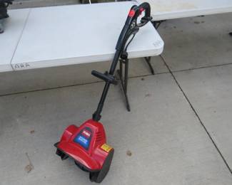 Lot 129. Toro 110-volt Power Shovel snowblower.