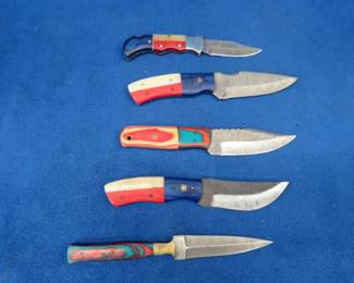 Lot 57. Five knives with leather sheaths, four fixed-blade, one folding.
