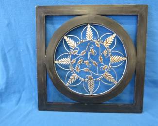 Lot 78. Metalware wall art. 26" x 26"