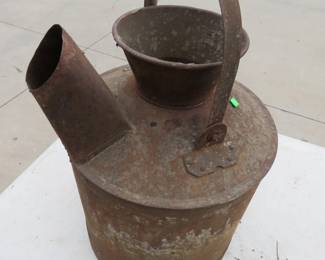 Lot 174. Old gas can and canes