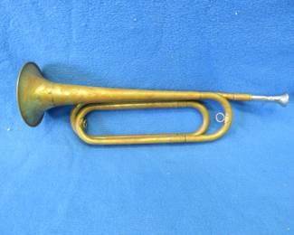 Lot 115. Old bugle as pictured. Includes two mouthpieces and a case.