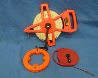 Lot 356. Lufkin 300' tape, Klein fish tape, and a Titan 20' sink snake