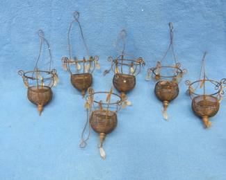 Lot 312. Six outdoor hanging candle holders