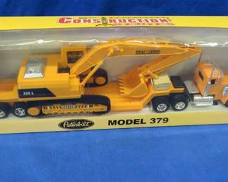 Lot 59. NewRay 1:32 scale Peterbilt Tractor Trailer in original box