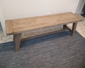 Bench; blue & white area rug
