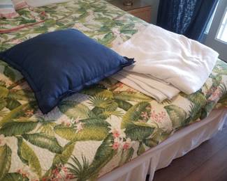 Bedding; oversize navy pillow; cozy white blanket
