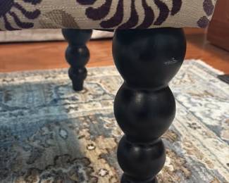Floral Upholstered Ottoman with Turned Legs