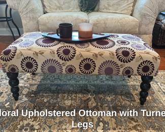 Floral Upholstered Ottoman with Turned Legs