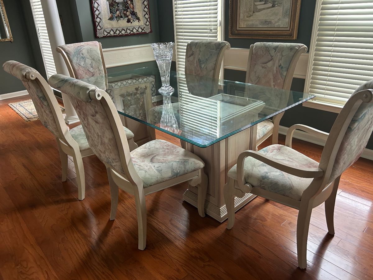 Glass top table with 6 chairs - sold separately. Excellent condition
