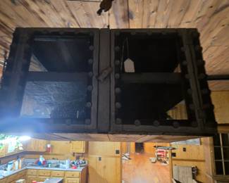 Primitive 2 door cabinet w/bottle caps. Made from crates.