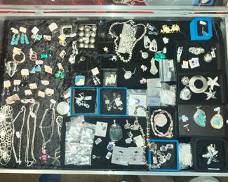 LARGE CASE FULL OF STERLING