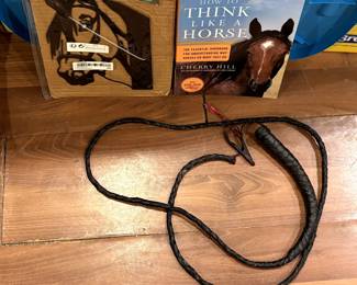 Antique leather horse whip.