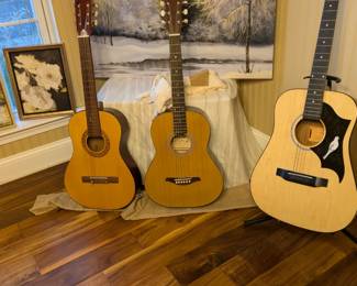 Acoustic guitars and beautiful Wall Art.