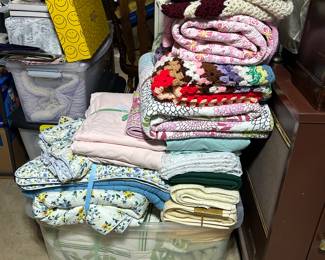 Wonderful collection of linens in great condition! Laura Ashley, Vera Bradley. Two homemade afghans. Sheet sets. Bedding blankets. Curtain sets. We also have a brand new Italian leather briefcase and several pieces of luggage for sale in excellent condition and of high quality.