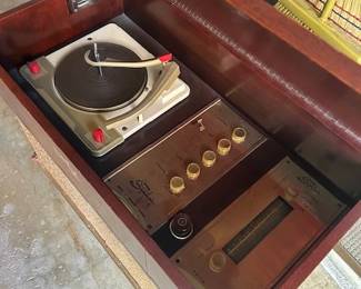 Music echoed through our home from this Symphonic Concert Master 1260 and we have all the records played on it for sale! May need some love to restore but worth it!! Even as a conversation piece in your home. So so lovely!