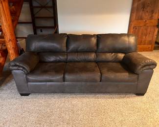 PRESALE - $300 Like New The Jackson Furniture Grant Queen Sleeper Sofa in Rustic Gray is designed with gorgeous bonded leather for a highly refined and sophisticated finish. The stitching throughout the Sleeper adds a subtle yet exquisite accent. The Jackson Furniture Grant Queen Sleeper Sofa in Rustic Gray features extremely plush, pillow-like arms that provide you with brilliant comfort. Additionally, the dense back cushions offer an unbelievable seated experience. The Jackson Furniture Grant Queen Sleeper Sofa in Rustic Gray also features blocked wooden legs that add a nice touch of detail.