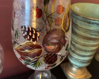hand-painted glass hurricane candle holder with a fall-themed design
