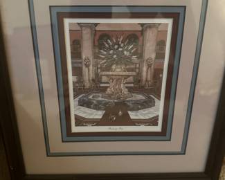 framed print titled "Peabody Pets" by artist Louise Dunavant. The print depicts the lobby of The Peabody Memphis hotel.