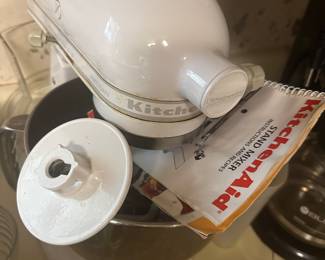 KitchenIAid Stand Mixer in white with attachments and booklet