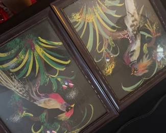 framed pieces of Mexican feather art