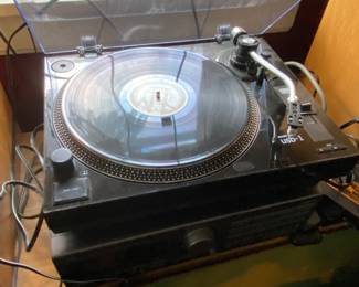 Turntable, and digital surround system receiver