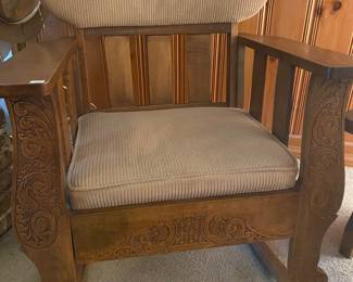 Beautifully carved wooden rocker