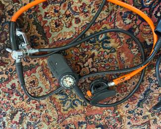 Scuba air gauges and mouthpieces