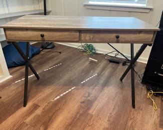 $75 Contemporary desk, driftwood finish with metal frame, two drawers; 30 inches high by 43 1/4 inches wide by 20 1/2 inches deep.