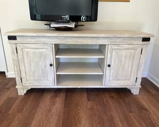 $150 Modern driftwood-colored console media cabinet; 32.25” high x 66” wide x 19” deep 