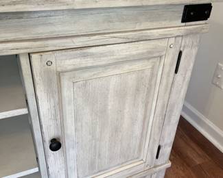 $150 Modern driftwood-colored console media cabinet; 32.25” high x 66” wide x 19” deep 