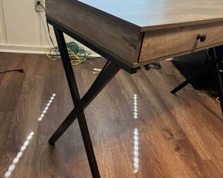$75 Contemporary desk, driftwood finish with metal frame, two drawers; 30 inches high by 43 1/4 inches wide by 20 1/2 inches deep.