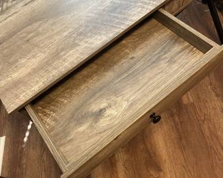 $75 Contemporary desk, driftwood finish with metal frame, two drawers; 30 inches high by 43 1/4 inches wide by 20 1/2 inches deep.