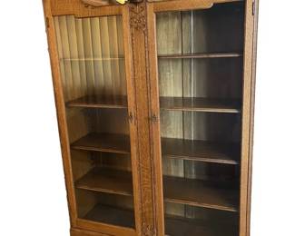 Antique Quarter Sawn Oak Bookcase with mirroered crest and carved details early 1900s