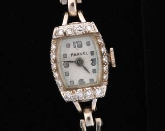Lot 251: Harvel Ladies 14k Gold White Sapphire Wrist Watch