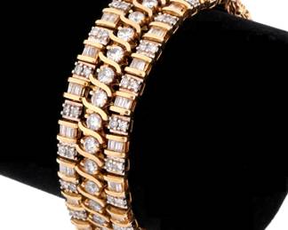 Lot 94b: Triple Band 14k Gold and Diamond Tennis Bracelet