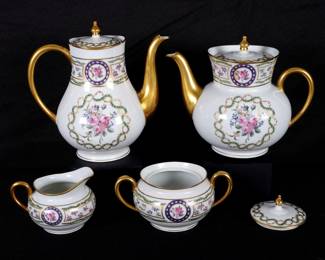 Lot 227: Haviland Limoge Four Piece Porcelain Tea Service