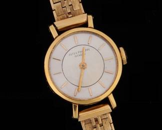 Lot 108a: Ladies 14k Gold Patek Philippe Wrist Watch
