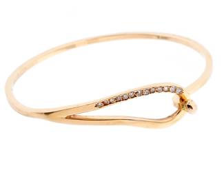 Lot 100: 14k Yellow Gold Diamond Clip Bangle Bracelet