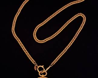 Lot 81: Chanel Gold Toned Magnifying Glass on Chain