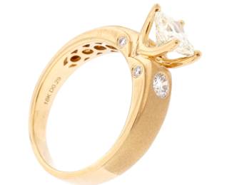 Lot 281: 18k Yellow Gold and Radiant Diamond Ring