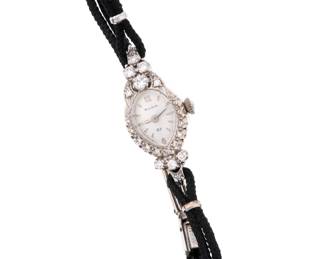Lot 250: Bulova 14k Gold and Diamond Ladies Wrist Watch