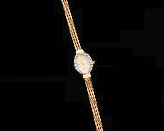 Lot 206: Geneva Ladies 14k Gold & Diamond Wrist Watch