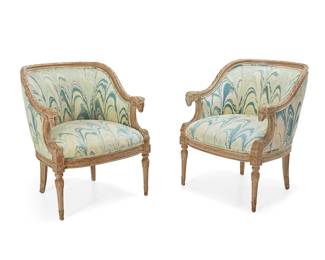 2070
A pair of Louis XVI-style armchairs
20th century
Each with tag to underside: Jerry's Custom Upholstery
The whitewashed wood chairs, each carved with foliate motif trimming, featuring ram's head armrest terminals, upholstered in a marbled pattern fabric
2 pieces
Each: 32.75" H x 25.75" W x 28.5" D
Estimate: $600 - $800