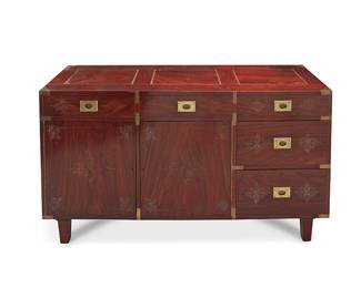 2129
An M. Hayat Brothers rosewood sideboard
Circa 1960; Peshawar, Pakistan
The sideboard with metal inlaid scroll ornamentation, featuring five felt-lined drawers and two cabinet doors, each revealing a single shelf, with brass mounts and drawer pulls, raised on tapered squared legs
31" H x 63.5" W x 18.25" D
Estimate: $400 - $600